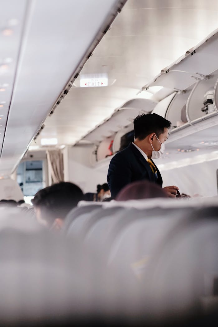 A Flight Attendant Wearing a Face Mask